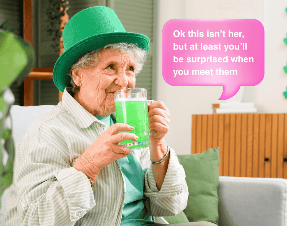 senior woman in green irish hat drinking green liquid from a large glass mug